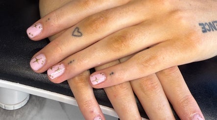 Elegant nail art featuring stars at Bonito Hair and Beauty, Rushden, England, GB.