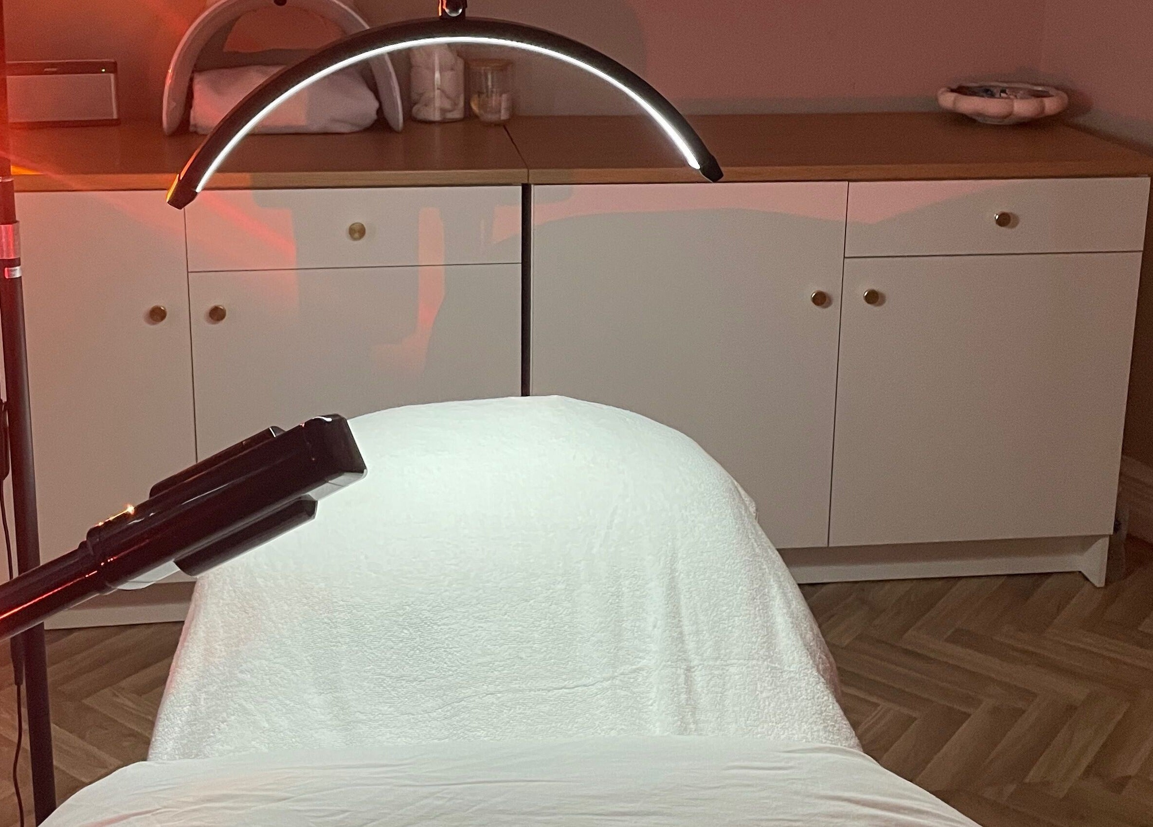 LED treatment area at Skin Deep, Worsley, England, GB with ambient lighting and sleek equipment.