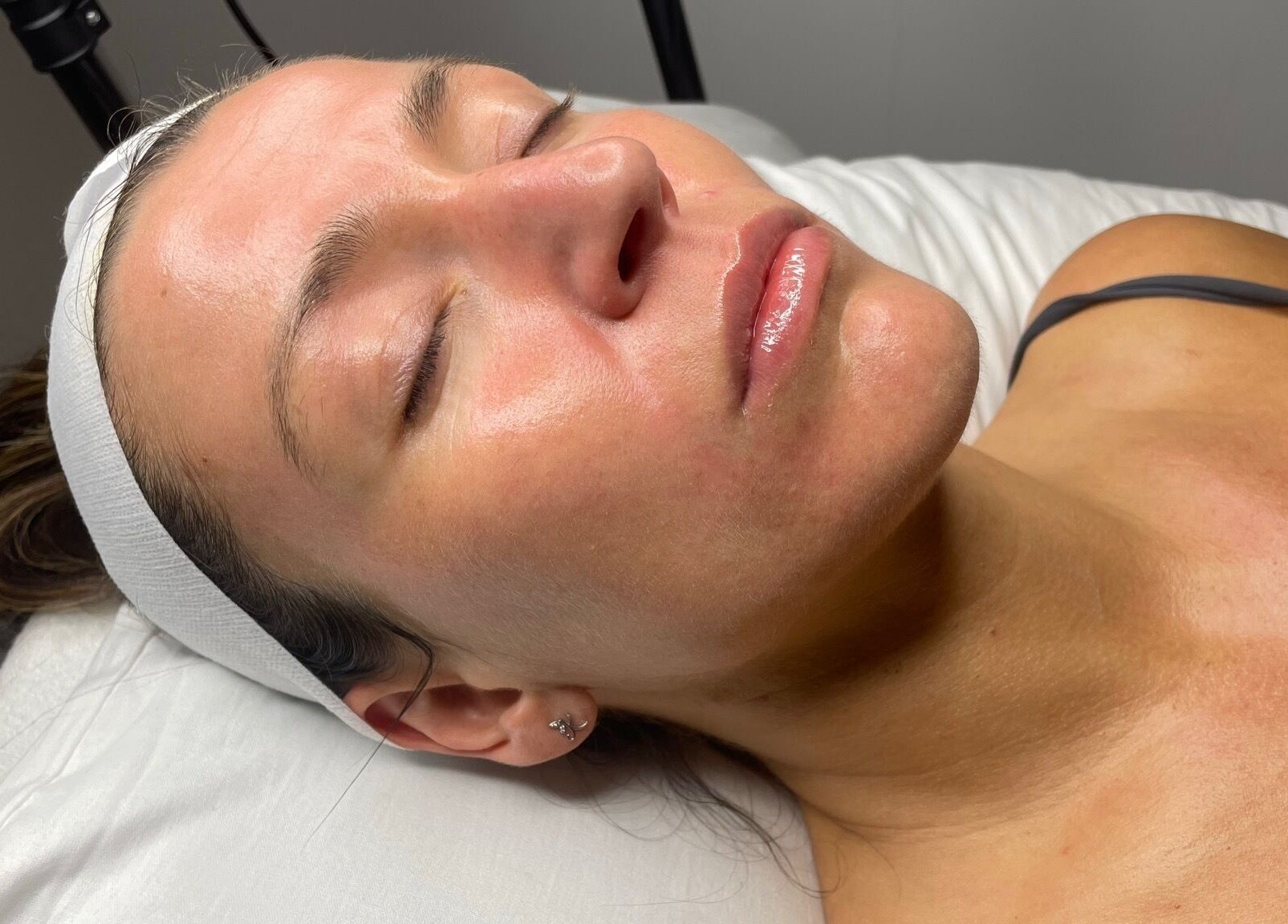 Relaxed client enjoying facial treatment at Skin Deep, Worsley, England, GB for radiant, healthy skin.