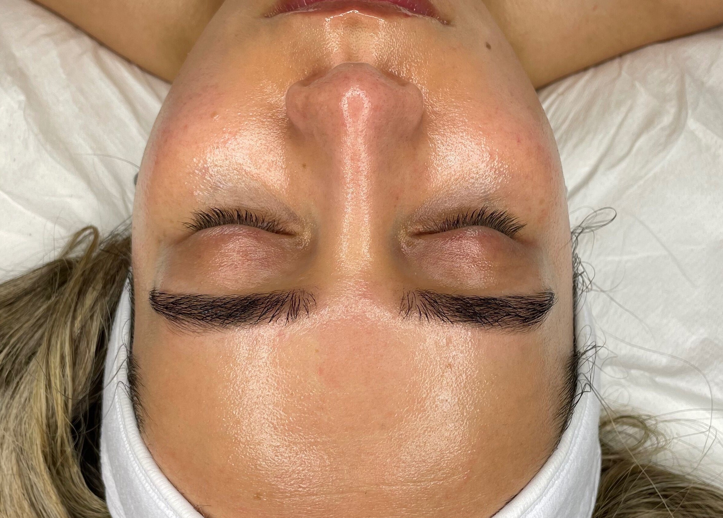 Close-up of a serene face during a beauty treatment at Skin Deep, Worsley, England, GB.