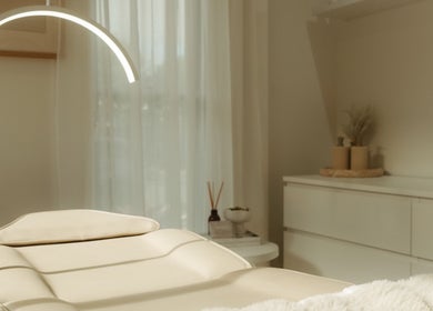 Cozy treatment room at ILash and Beauty Bar, Baringa, Queensland, AU, featuring a comfortable aesthetic chair.