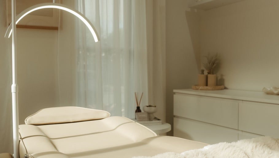 Elegant treatment room at ILash and Beauty Bar in Baringa, Queensland, AU featuring neutral decor and soft lighting.