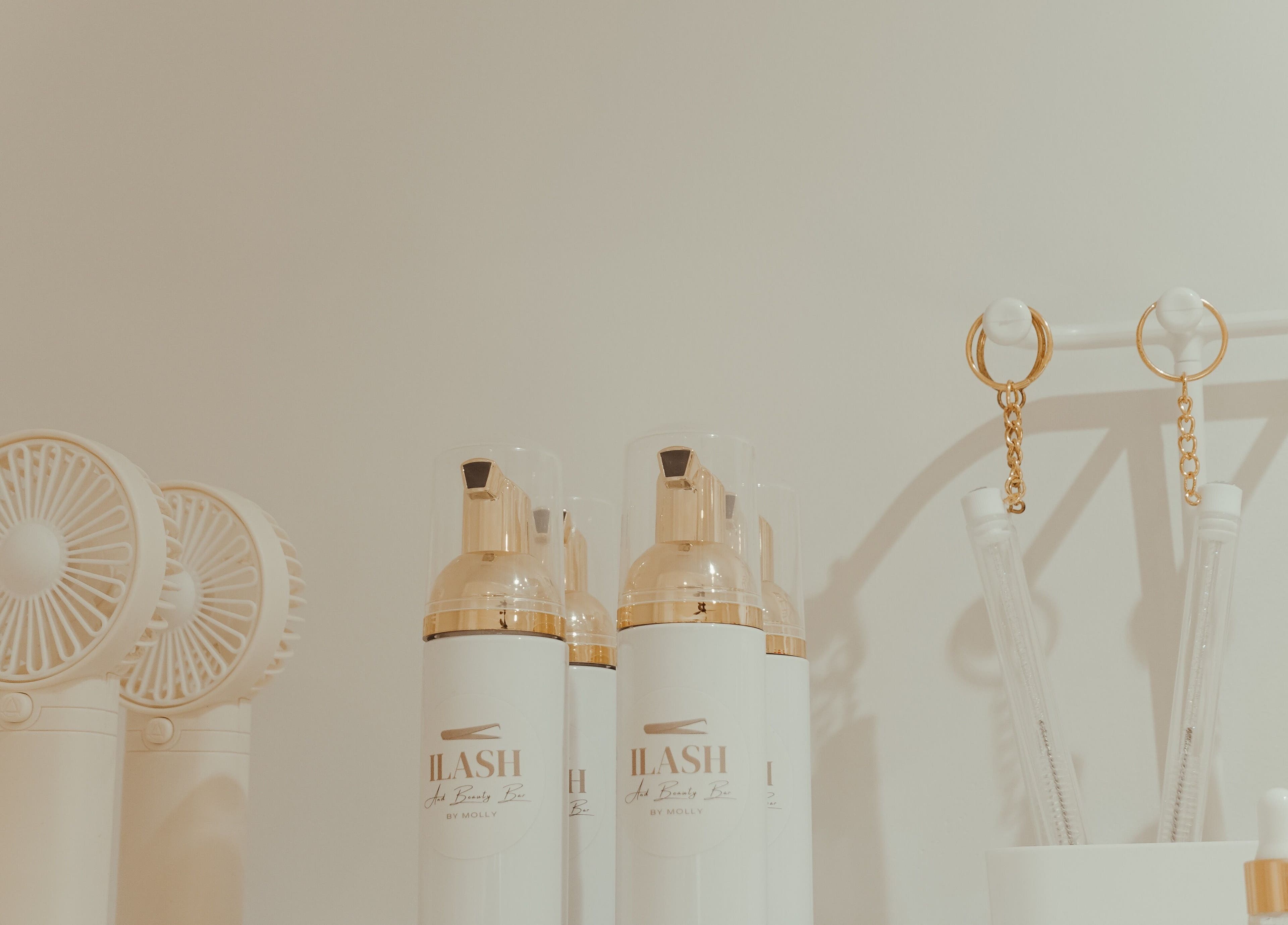 ILash and Beauty Bar in Baringa, Queensland, AU showcases sleek beauty products on a stylish counter.