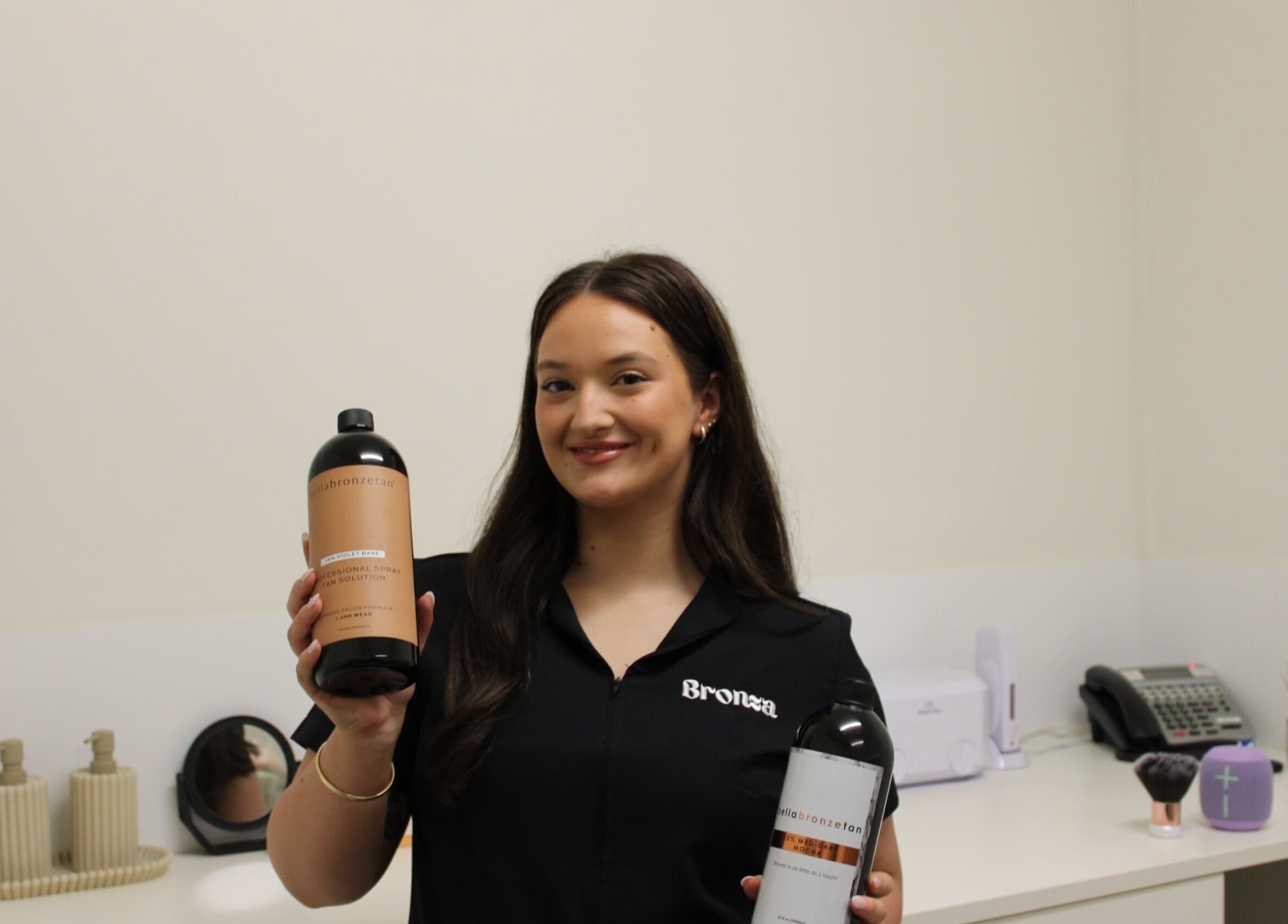 Bronza staff showcasing premium tanning solutions in Warrnambool, Victoria, AU.