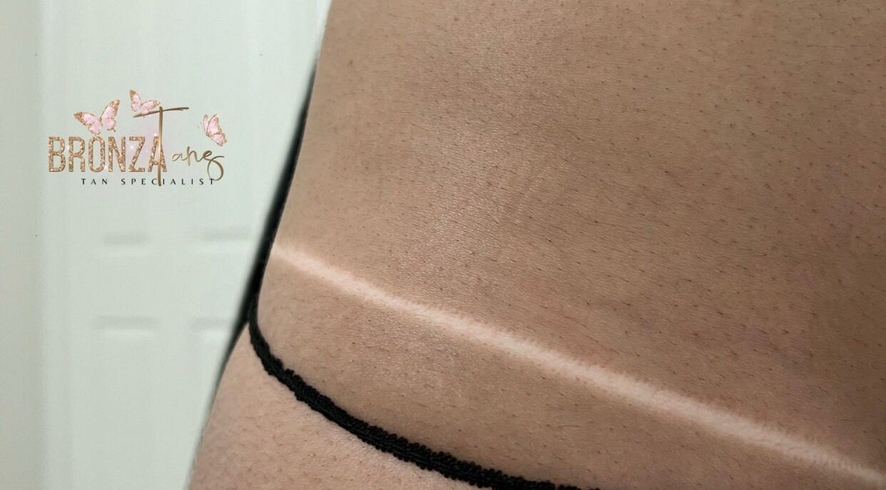 Natural tan lines showcased at Bronza, Warrnambool, Victoria, AU. Highlighting expert tanning services.