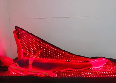 Person enjoying red light therapy at ReVive at the Ridge - Fuquay, Fuquay-varina, North Carolina, US.