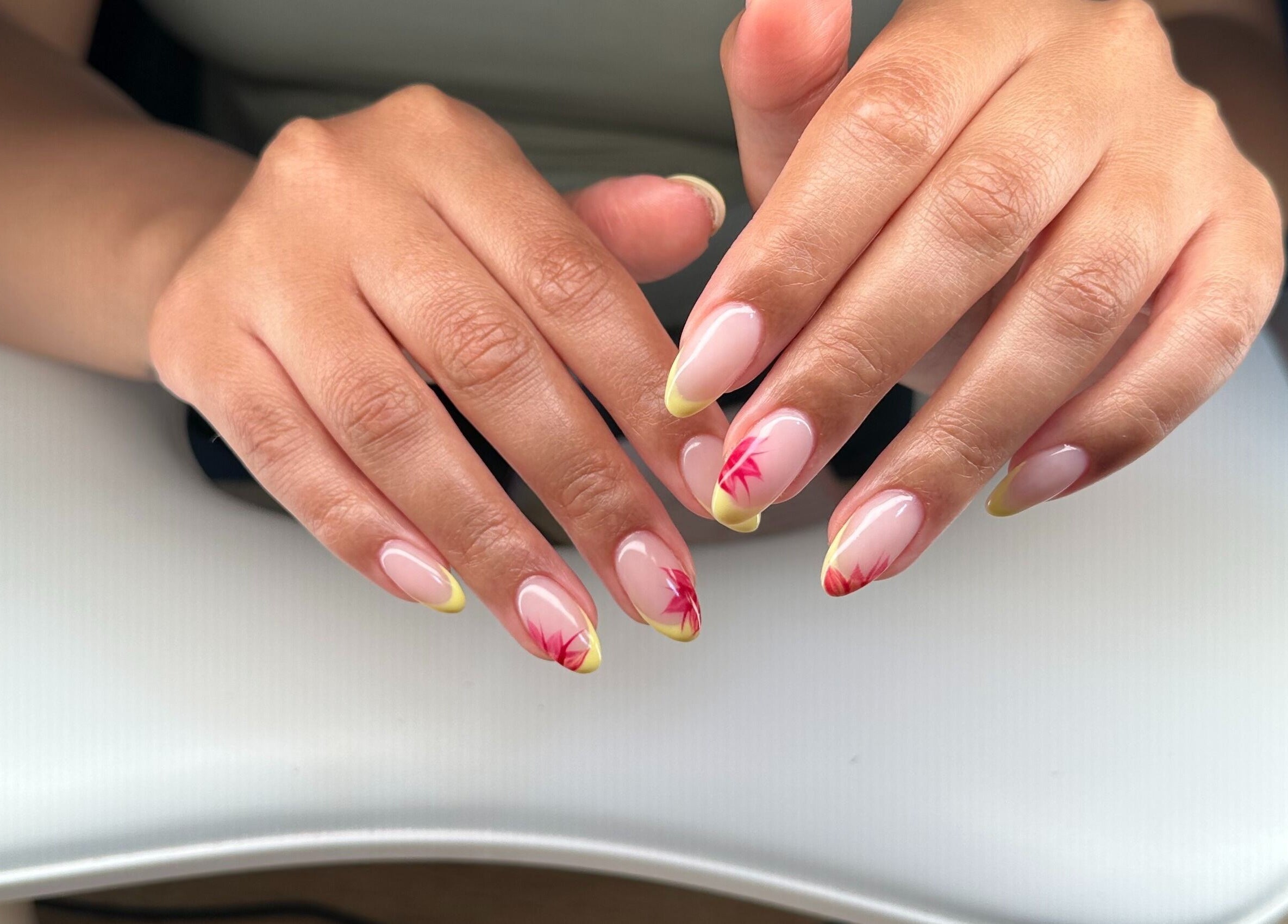 Elegant nail design with floral art at Polished By Sam, Bracknell, England, GB.