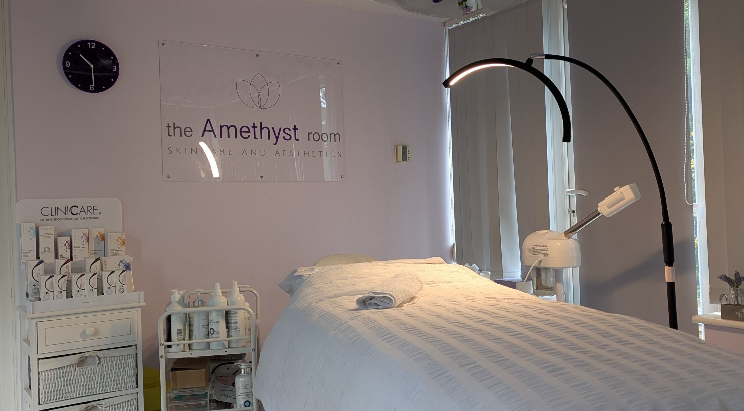 Relaxing treatment room at The Amethyst Room Rayleigh, featuring a cozy bed and aesthetic equipment in Rayleigh, England, GB.
