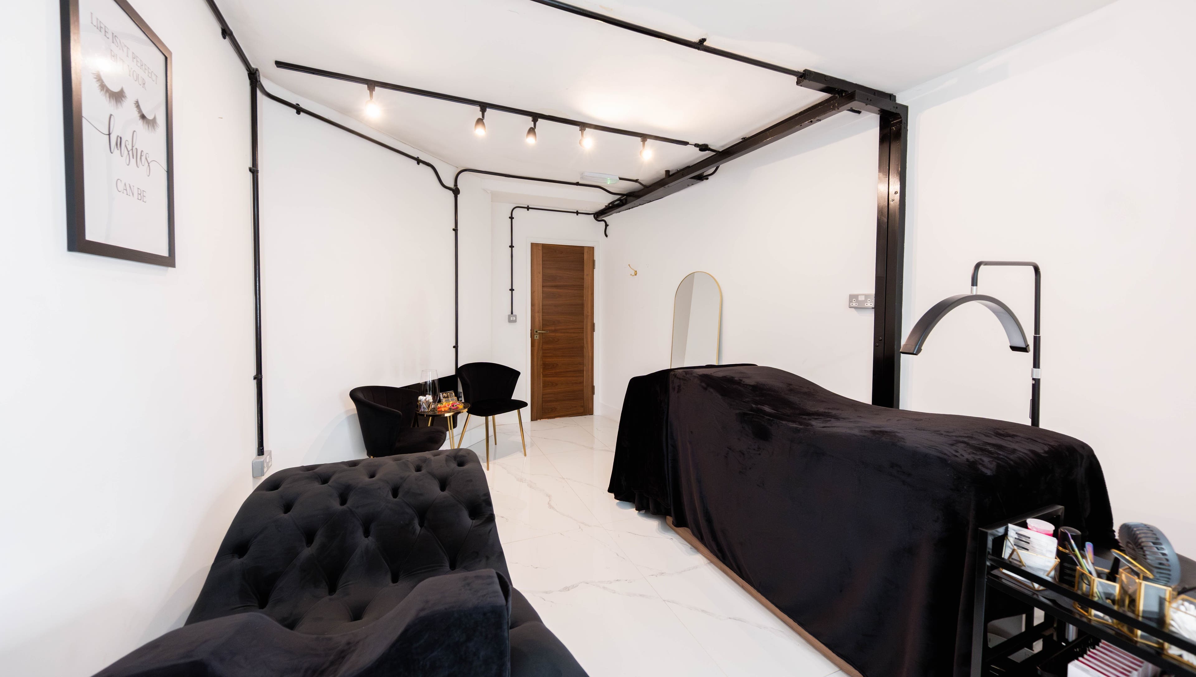 AV Lashes London in London, England, GB, showcasing a chic lash treatment room with plush decor.