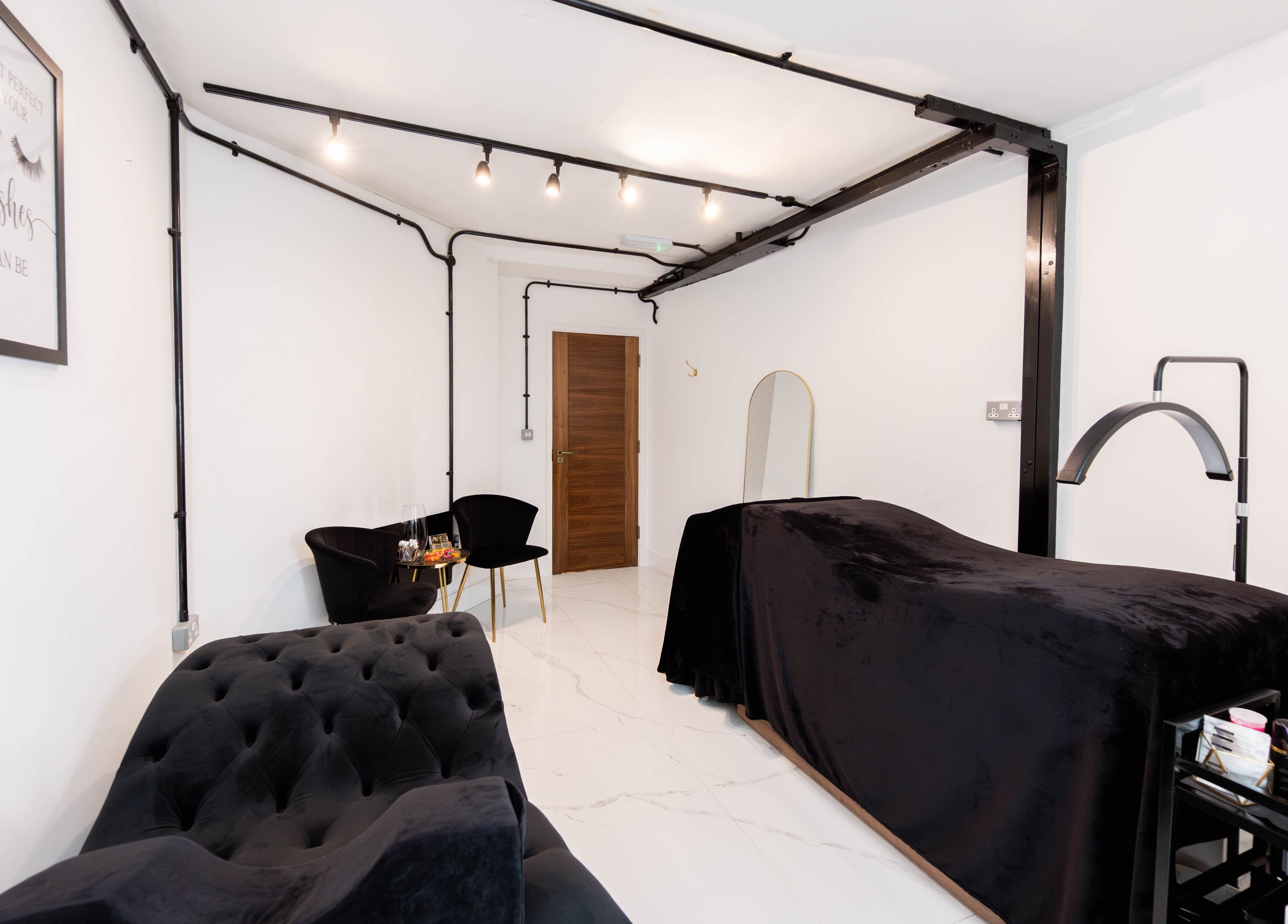 AV Lashes London in London, England, GB, showcasing a chic lash treatment room with plush decor.