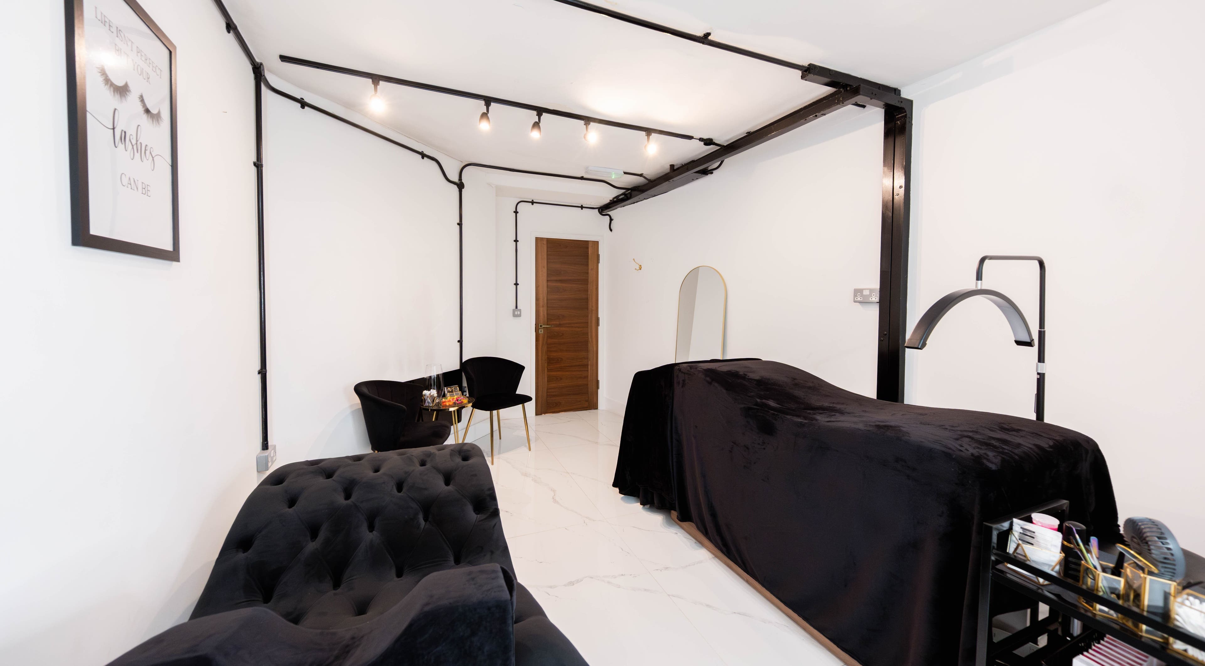 AV Lashes London in London, England, GB, showcasing a chic lash treatment room with plush decor.