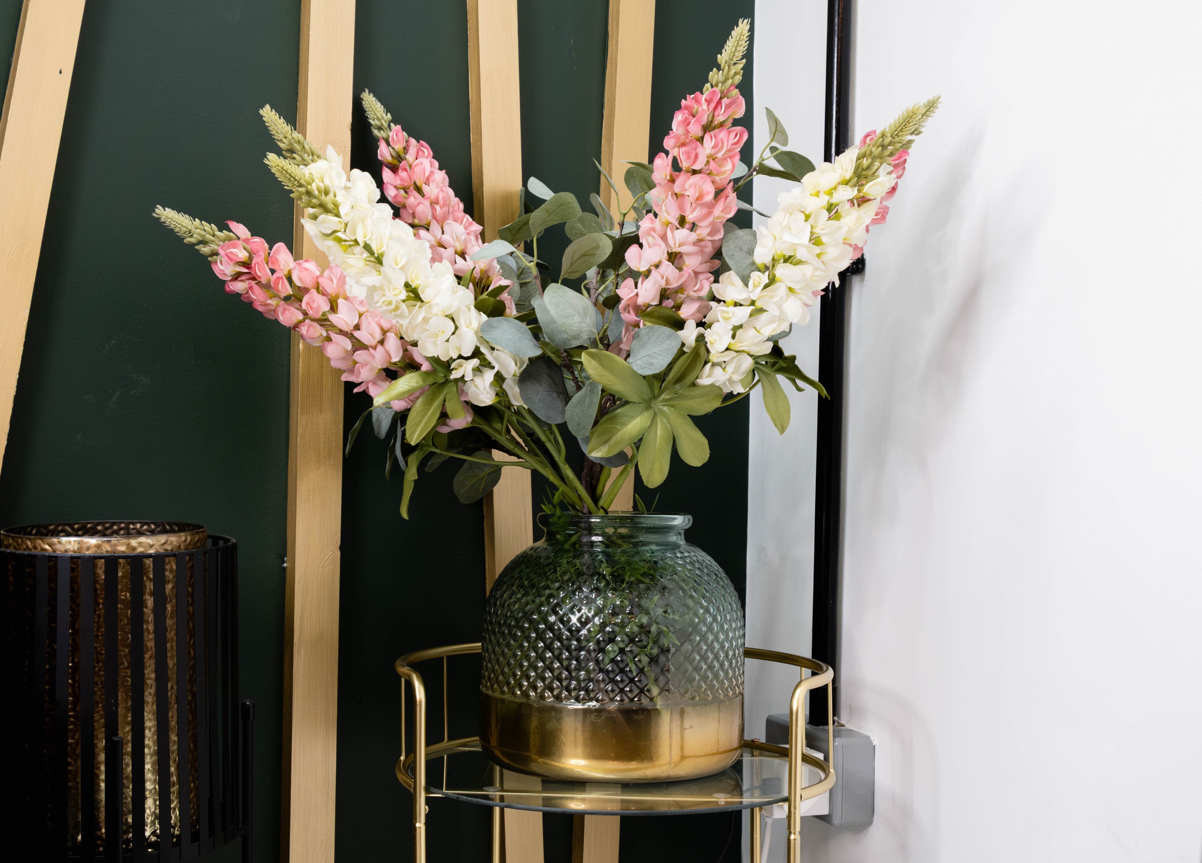 Elegant floral arrangement in a vase at AV Lashes London, located in London, England, GB. Perfect decor.