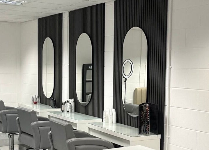Elegant salon mirrors and chairs at The Secret Salon, Dinnington, England, GB.