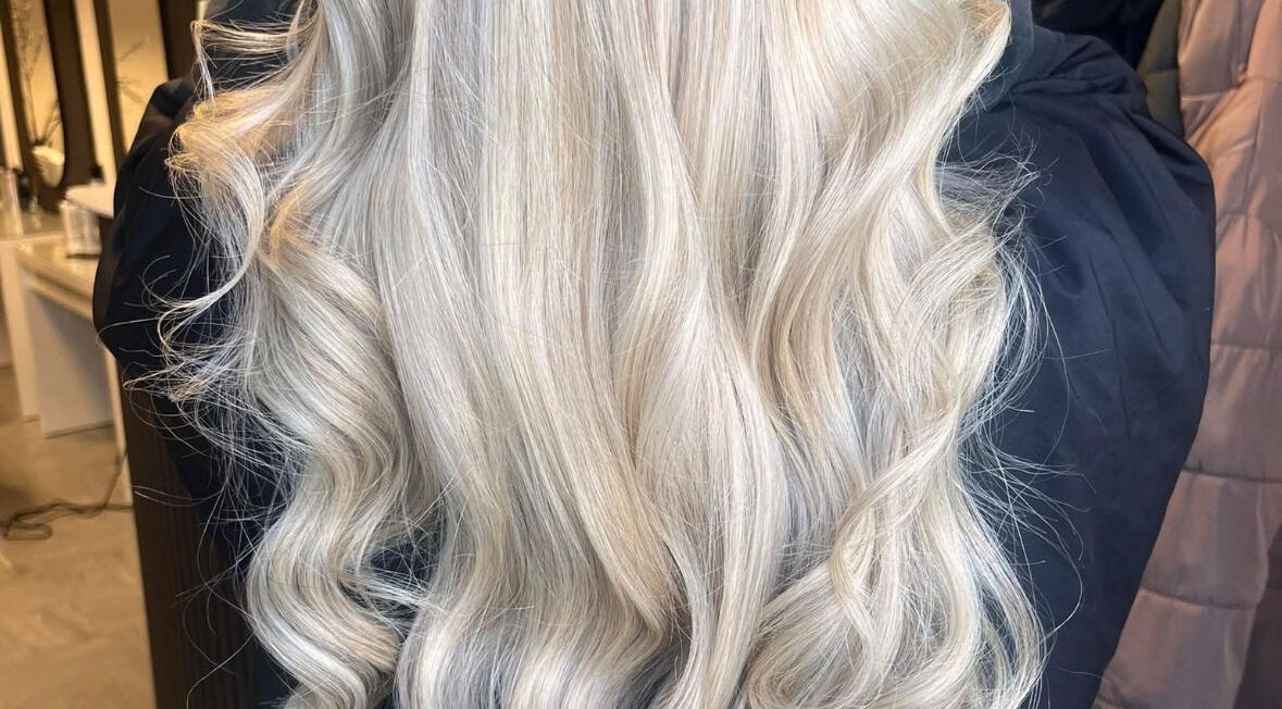 Silky blonde waves showcased at The Secret Salon, Dinnington, England, GB, ideal for premium hair styling.