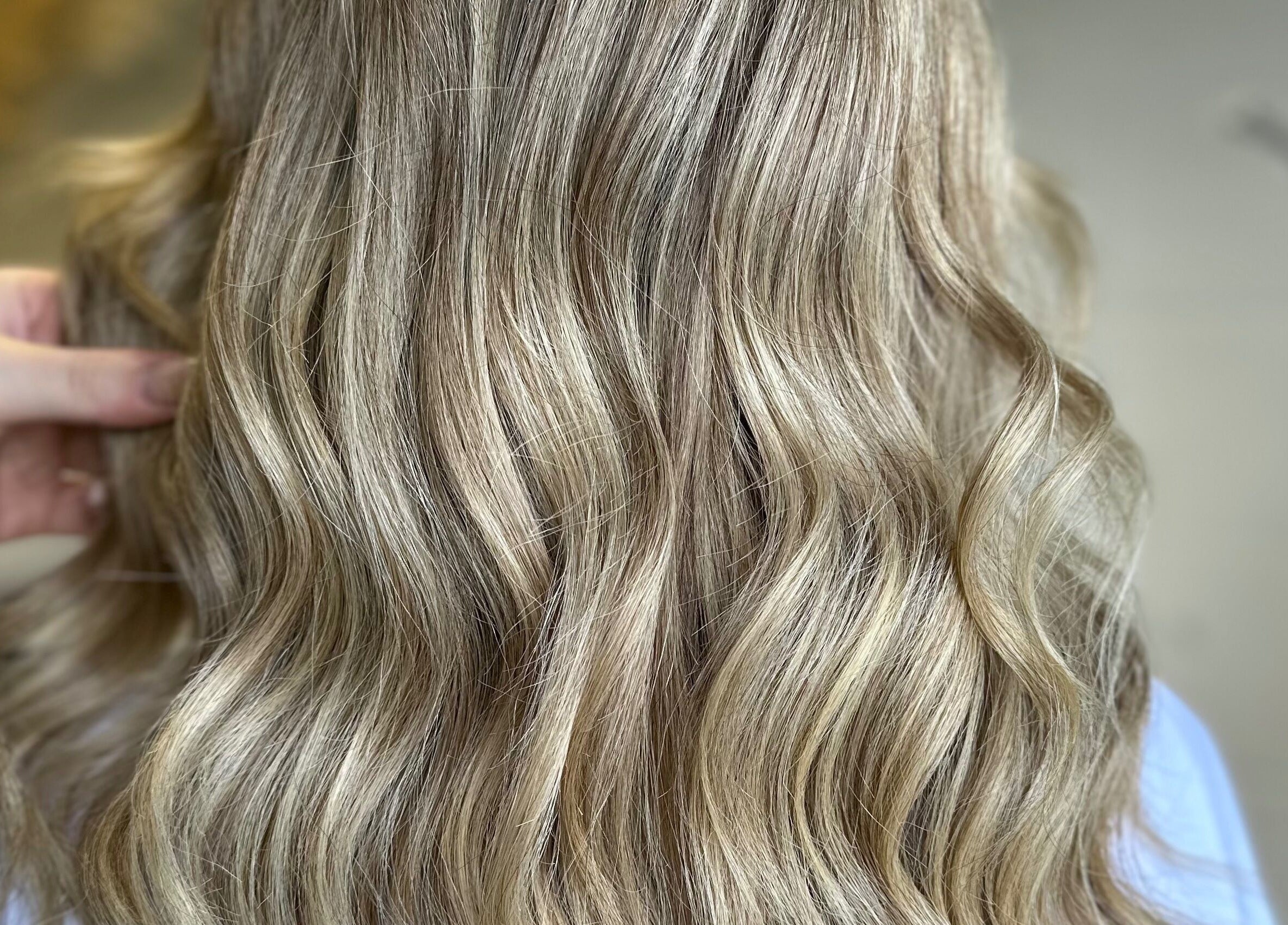 Beautifully styled blonde waves at The Secret Salon, Dinnington, England, GB.