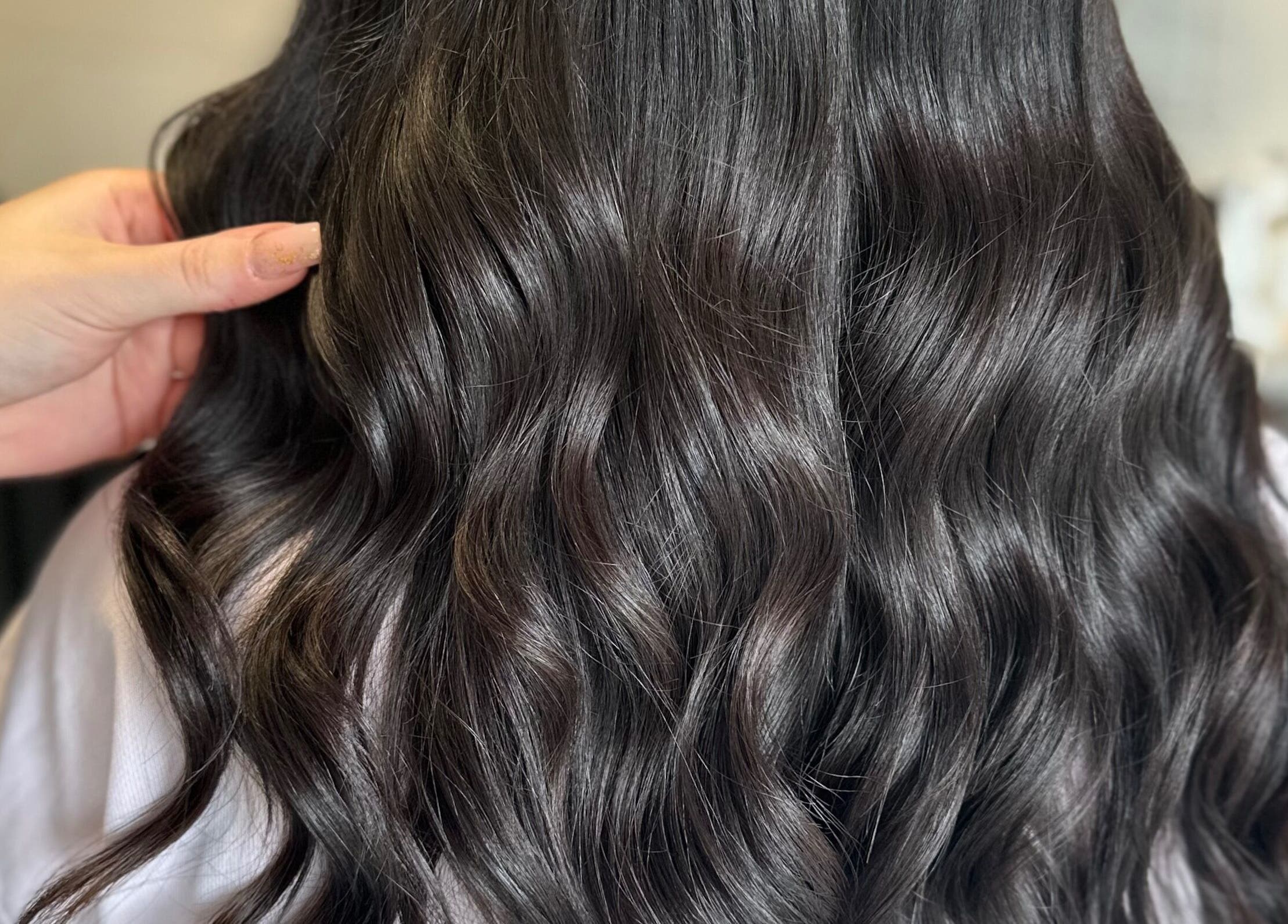 Lustrous dark waves styled at The Secret Salon, Dinnington, England, GB.