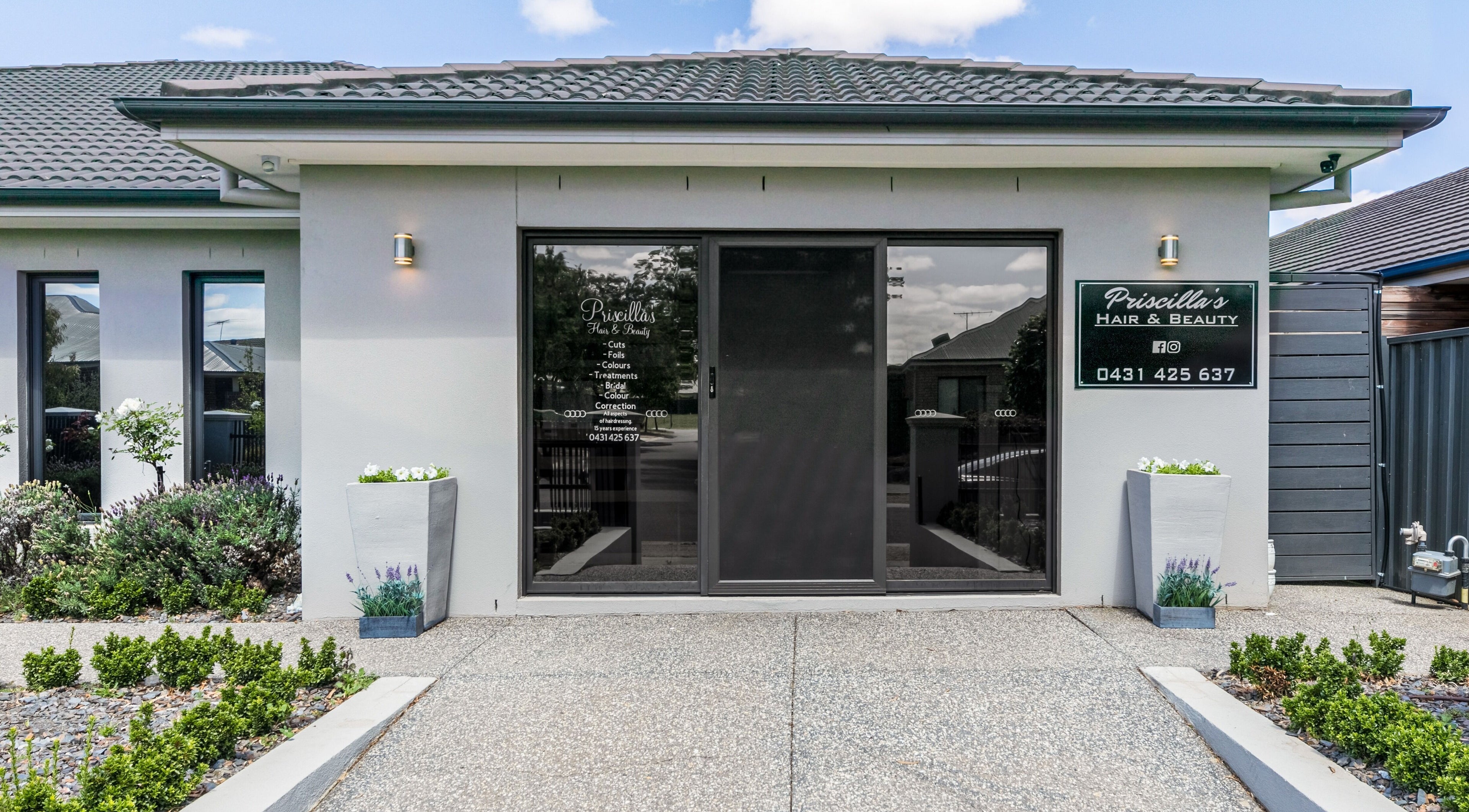 Exterior view of Priscilla's Hair and Beauty in Melbourne, Victoria, AU, showing front entrance and signage.