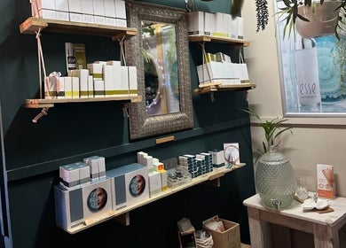 Chic product display at AfriU Refinery, George, Western Cape, ZA with elegant shelves and beauty items.