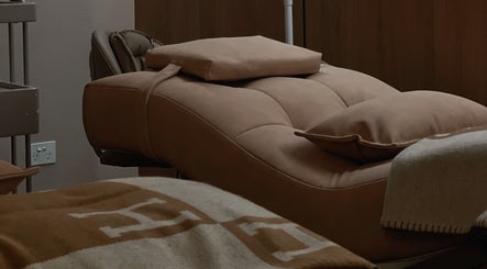 Comfortable spa chair at Hers Luxe - Camberwell, Melbourne, Victoria, AU, offering a serene wellness experience.
