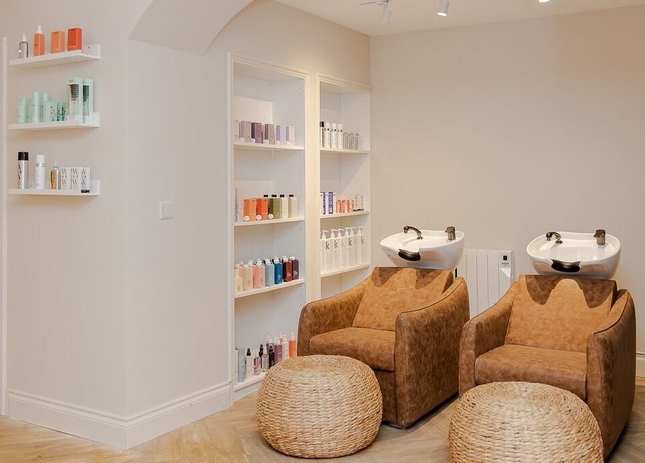 Luxurious wash station at The Suite by Jennifer O’Kane, Limerick, IE, featuring premium hair care products.