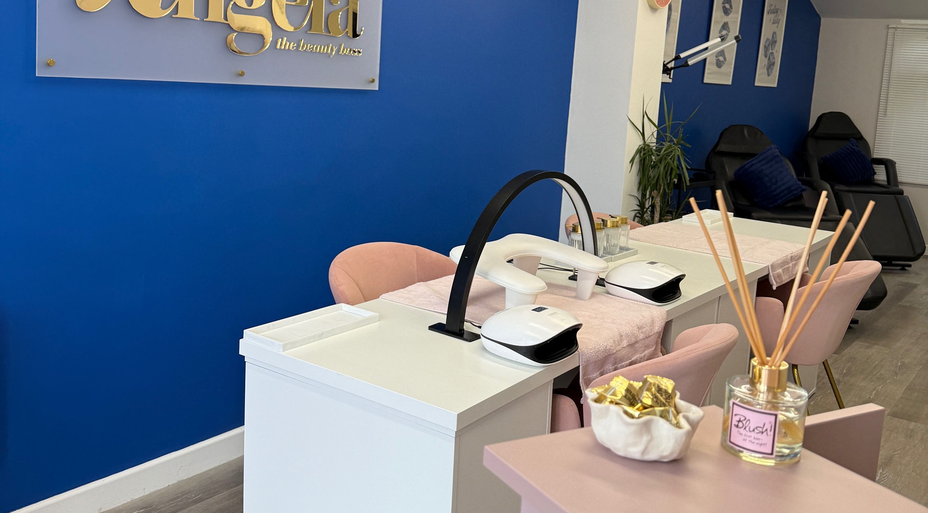 Elegant beauty studio setup at Angela The Beauty Boss in Stapleford, England, GB with modern chairs and tables.