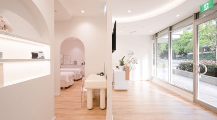 Bright, modern interior of Naomi Laser and Skin Clinic in Mascot, New South Wales, AU showcasing treatment rooms.
