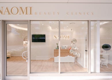 Front view of Naomi Laser and Skin Clinic, Mascot, New South Wales, AU featuring sleek glass facade.