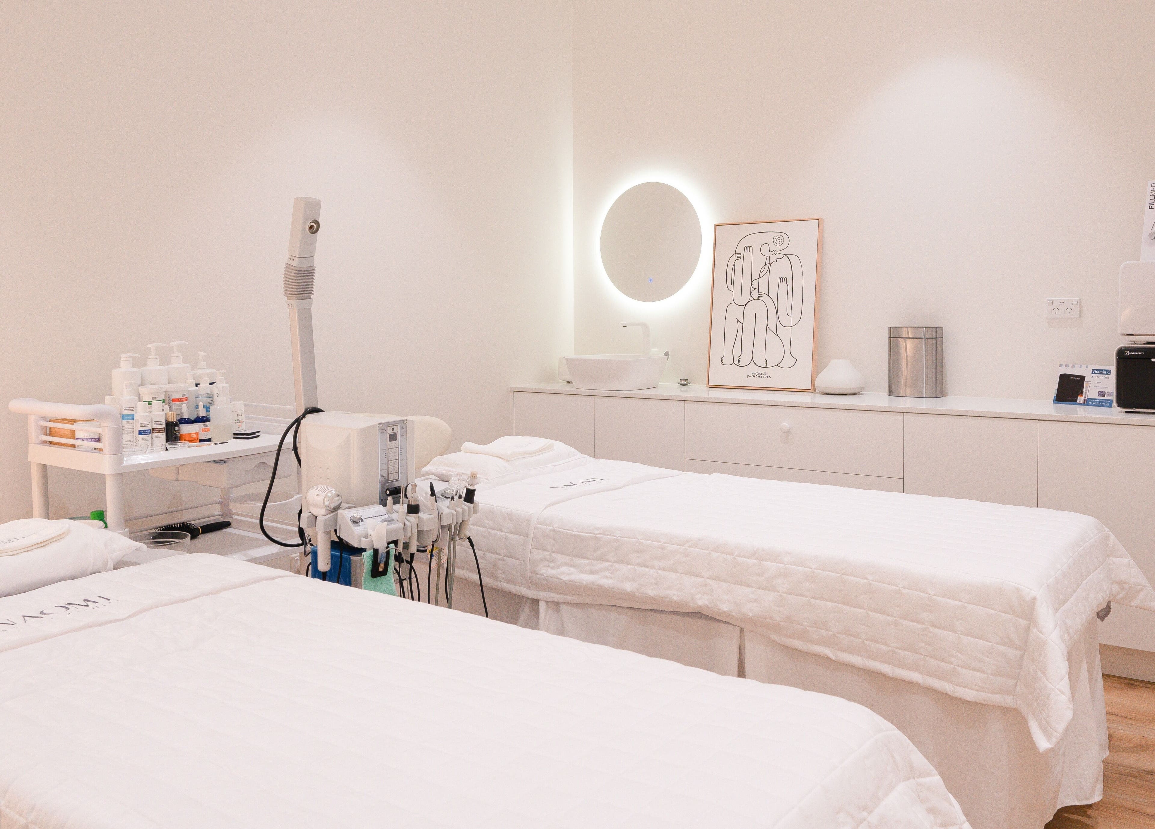 Modern treatment room at La Mascotte Skin and Laser Clinic, Mascot, New South Wales, AU, featuring two spa beds.