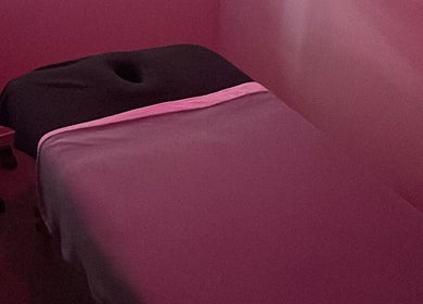 Massage room with soft pink lighting at Mairanga Wellness - Alfriston in Auckland, Auckland, NZ.