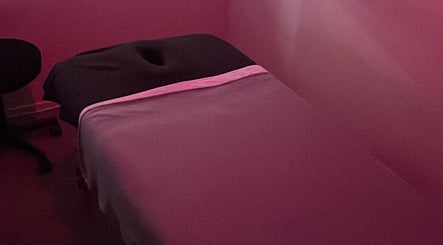 Massage room with soft pink lighting at Mairanga Wellness - Alfriston in Auckland, Auckland, NZ.
