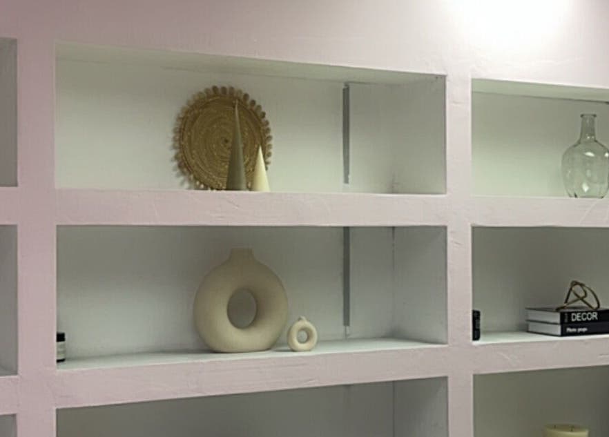 Elegant shelving with decor at Melanin Lash Bar SA, Sandton, Gauteng, ZA.
