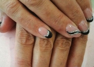 Stylish black and silver manicure at Beauty and aesthetics by Carlie, Westmoors, England, GB.