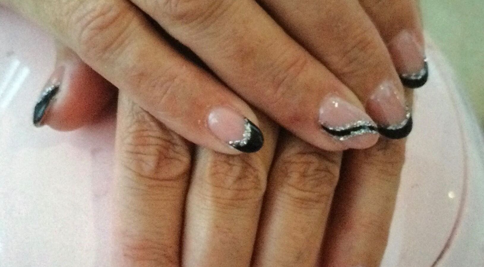 Stylish black and silver manicure at Beauty and aesthetics by Carlie, Westmoors, England, GB.