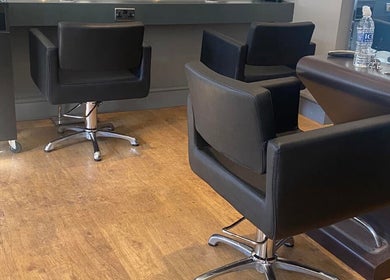 Modern styling chairs at MKM.hair, Perth, Scotland, GB, showcasing a sleek salon interior.