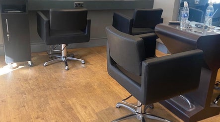 Modern styling chairs at MKM.hair, Perth, Scotland, GB, showcasing a sleek salon interior.
