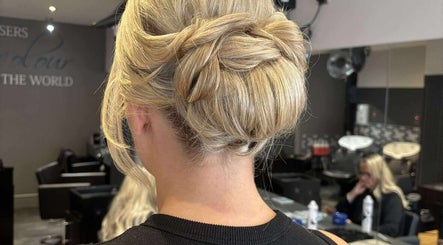 Blonde hair in a braided updo at MKM.hair, Perth, Scotland, GB salon, showcasing expert styling.