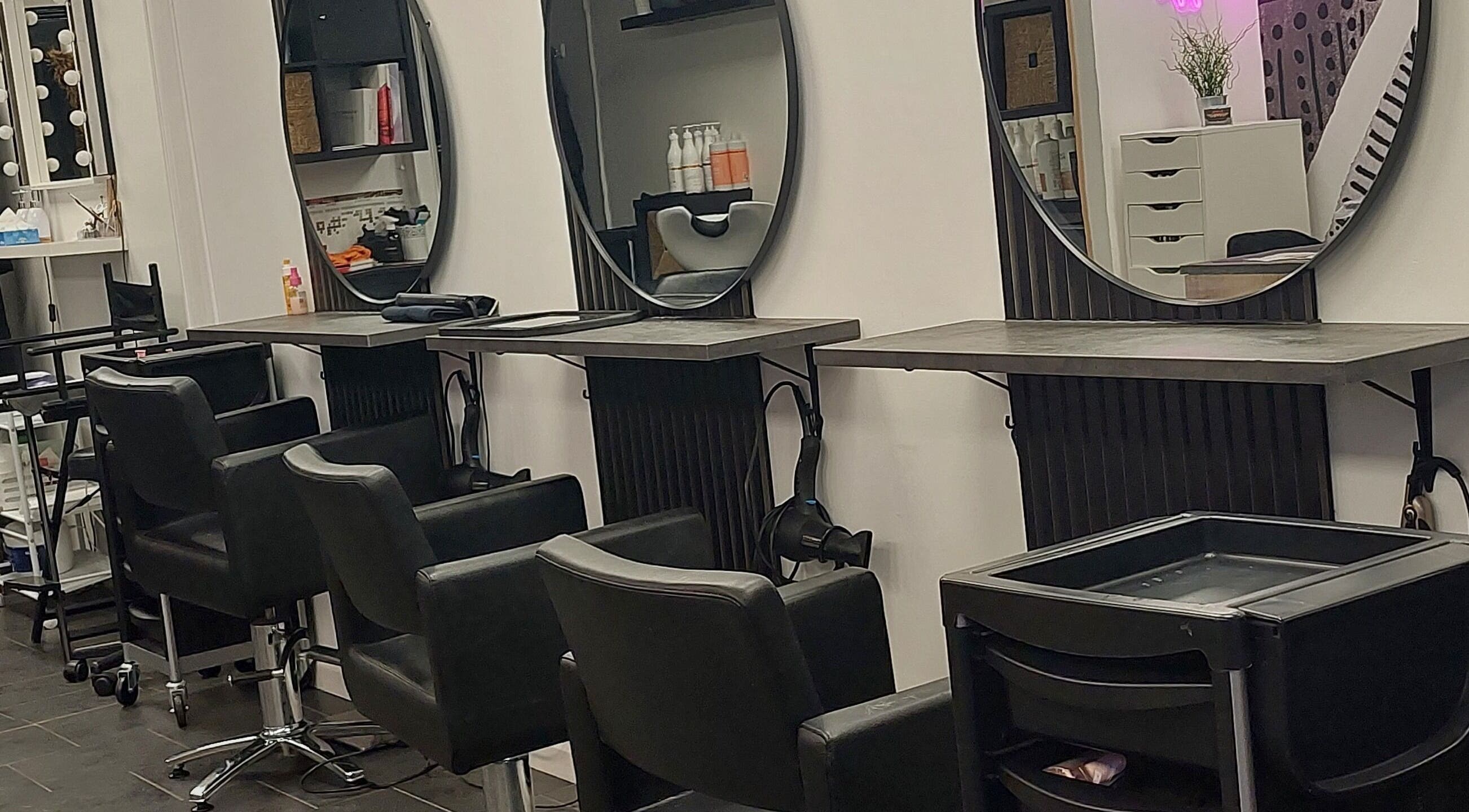 Modern salon chairs and mirrors at Salon19 Coleraine, Coleraine, Northern Ireland, GB offer a luxurious experience.
