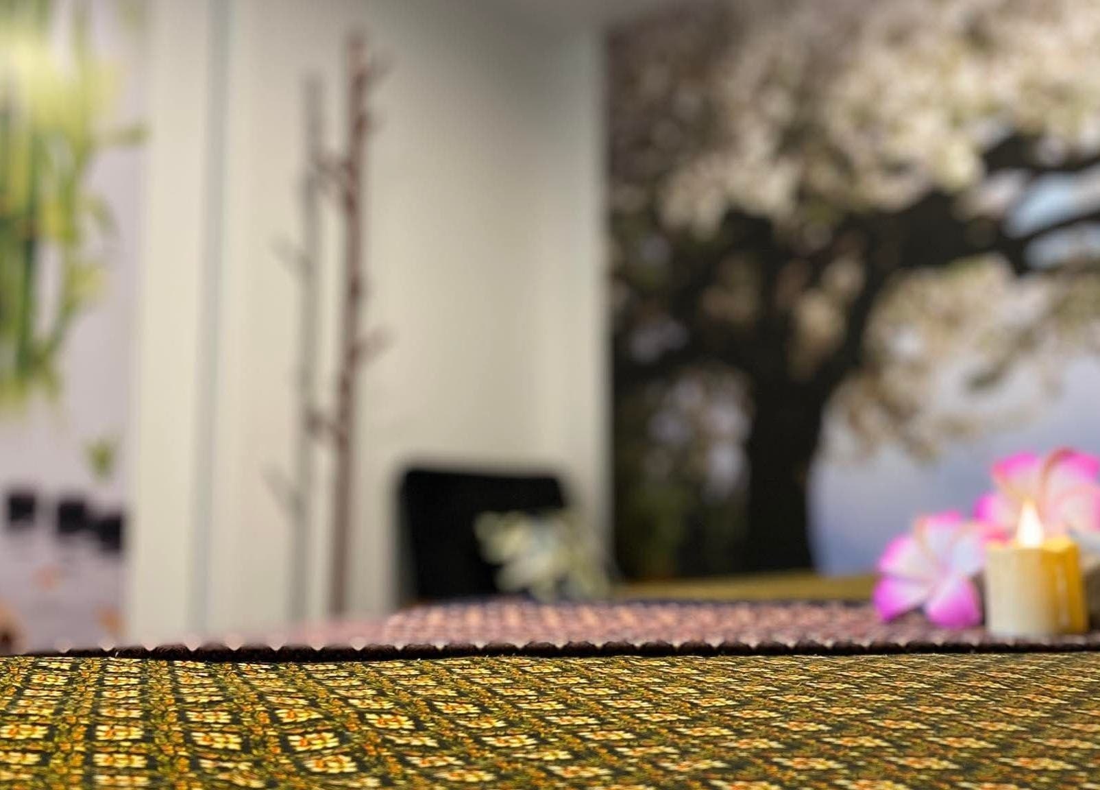 Serene massage room with floral decor at Sawasdee Massage, Christchurch, Canterbury, NZ.