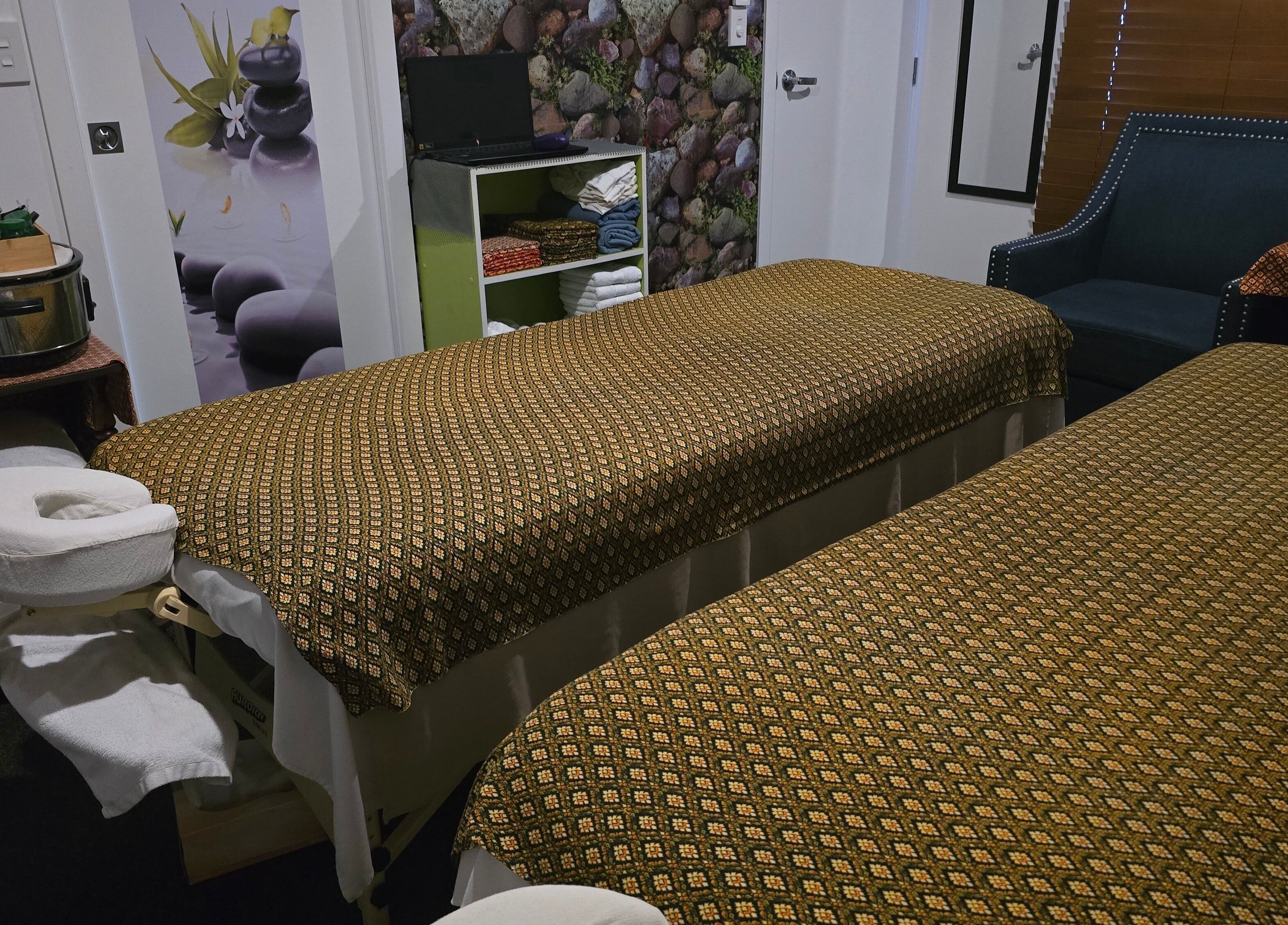 Relaxing massage room at Sawasdee Massage, Christchurch, Canterbury, NZ with two inviting tables.