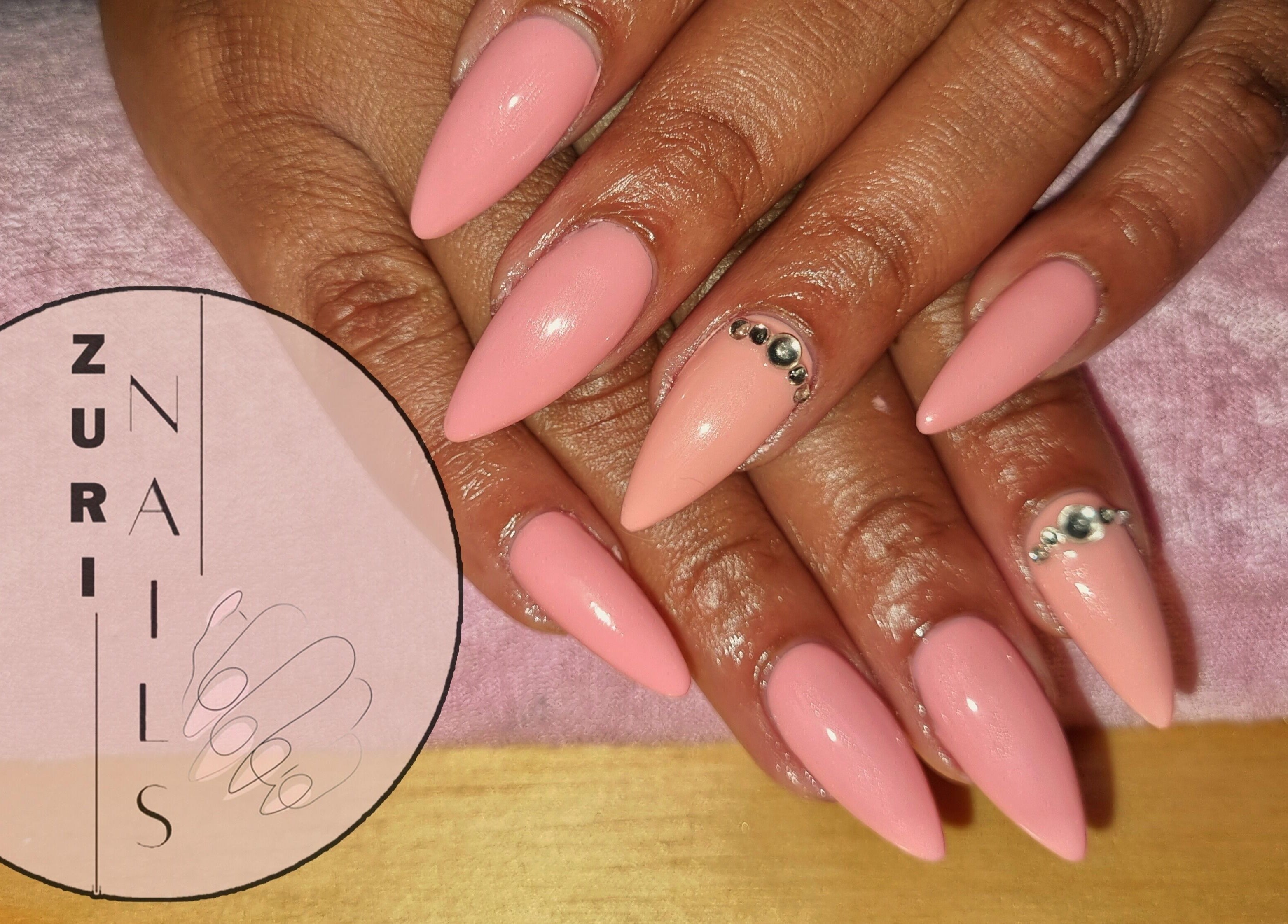 Elegant pink stiletto nails with gem detail at Zuri Nails - Kimberley, Rhodesdene, Northern Cape, ZA.