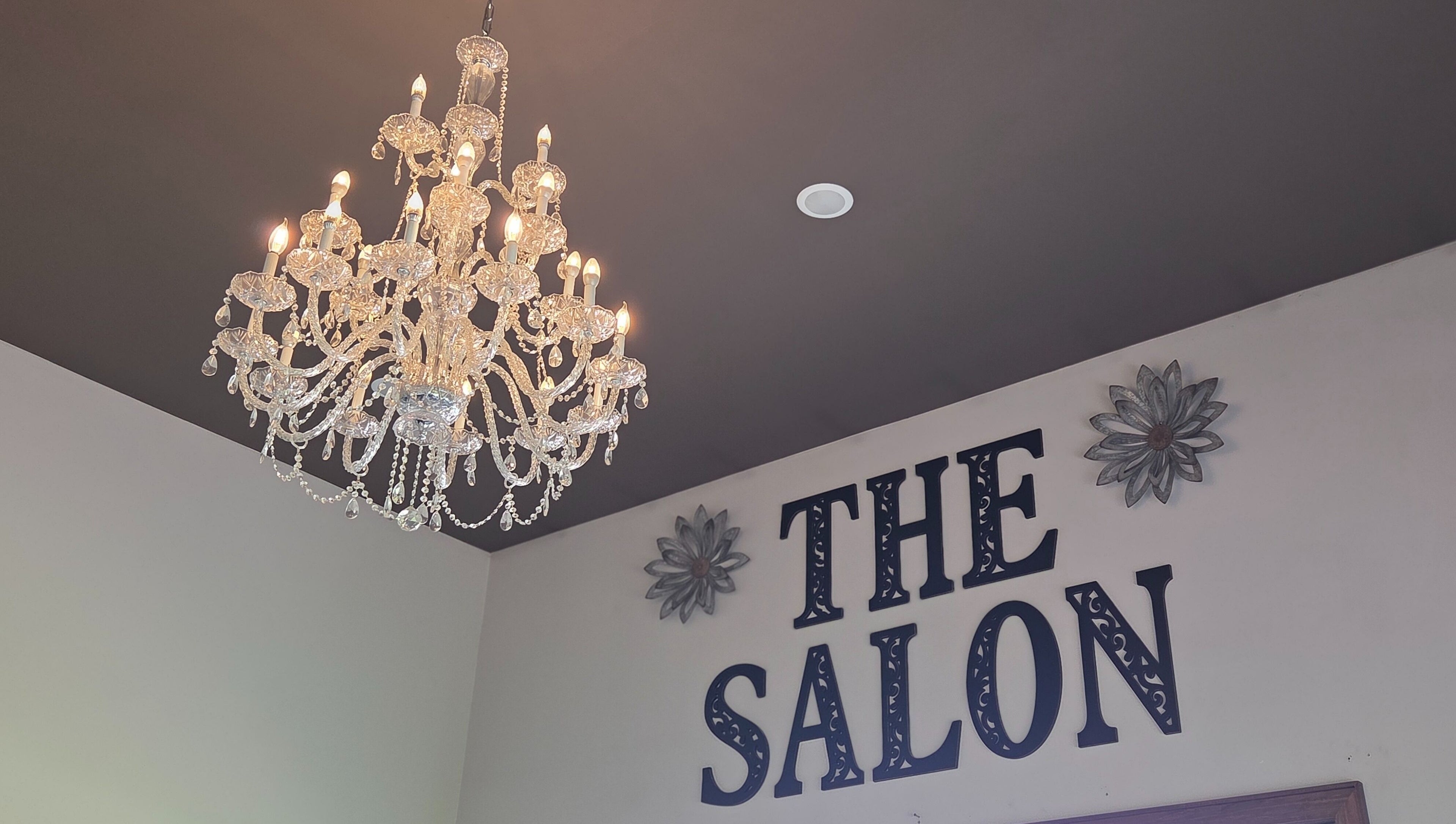 Crystal chandelier at Blair Derry Salon in Waverly, Minnesota, US, adding elegance to the salon ambiance.