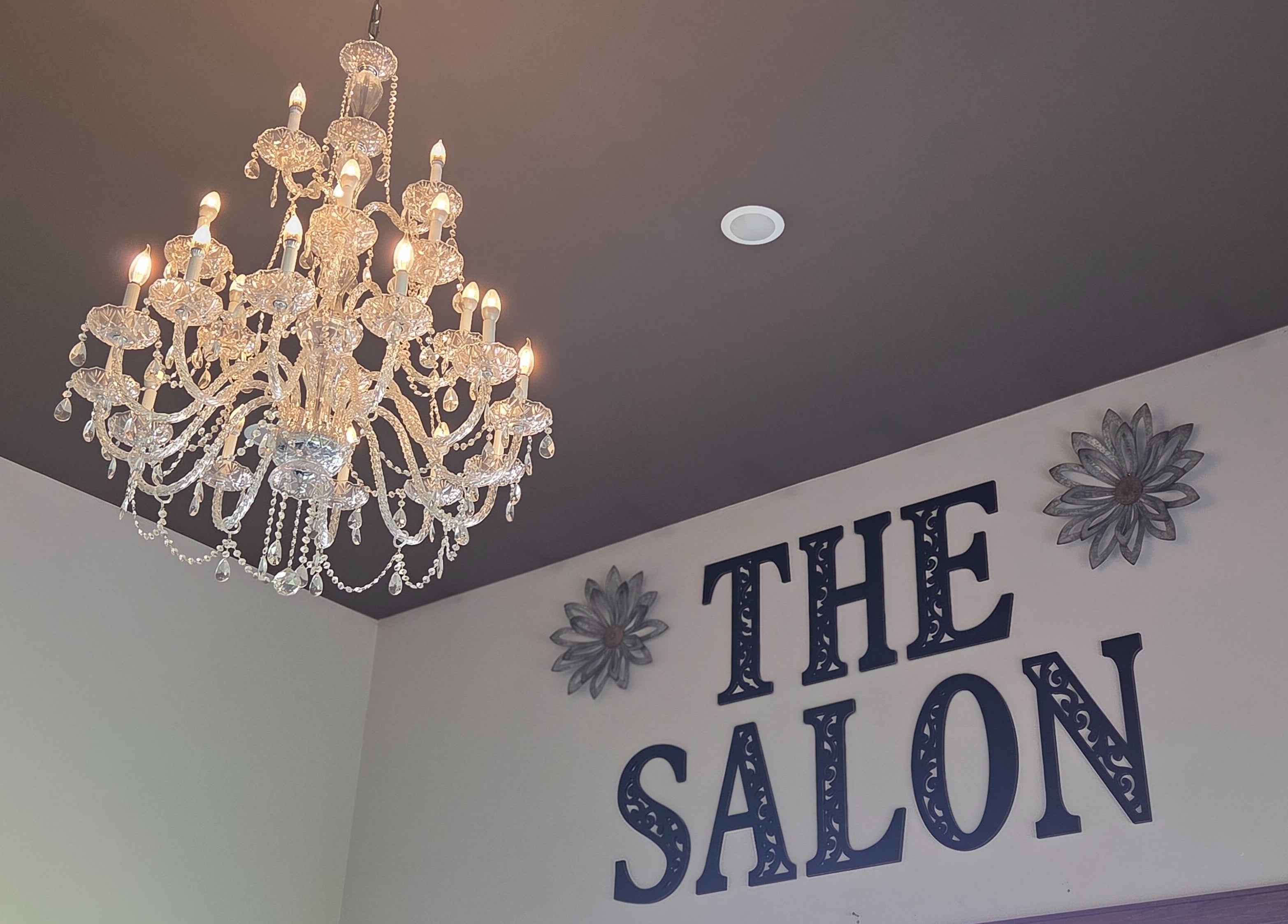 Crystal chandelier at Blair Derry Salon in Waverly, Minnesota, US, adding elegance to the salon ambiance.