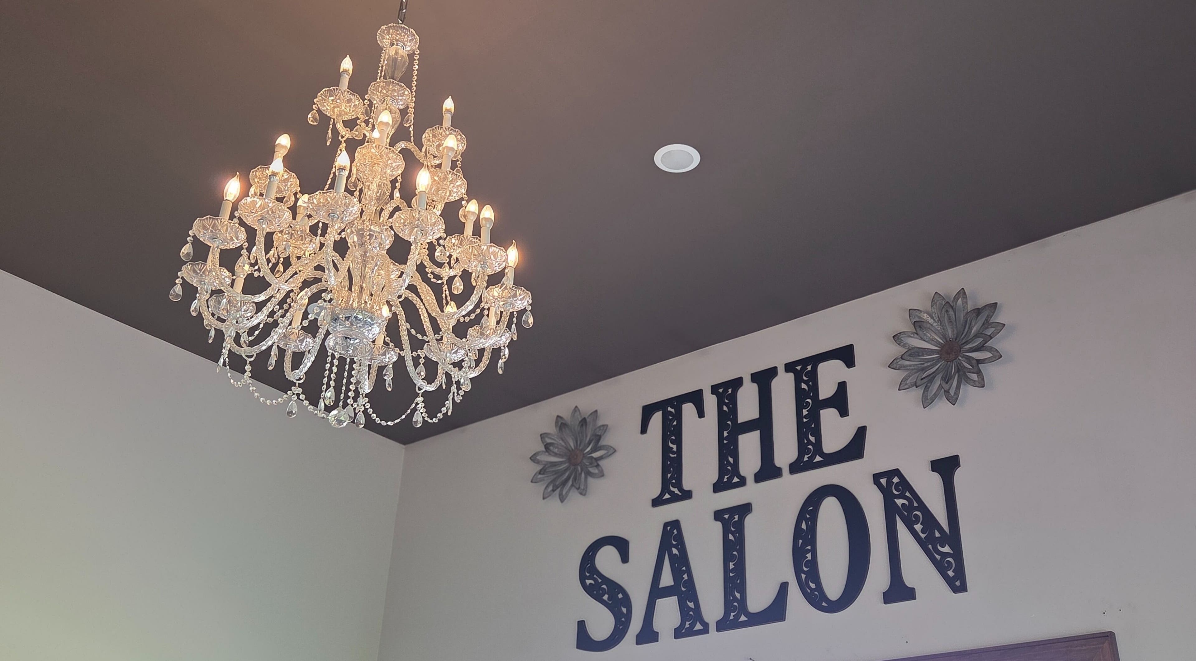 Crystal chandelier at Blair Derry Salon in Waverly, Minnesota, US, adding elegance to the salon ambiance.