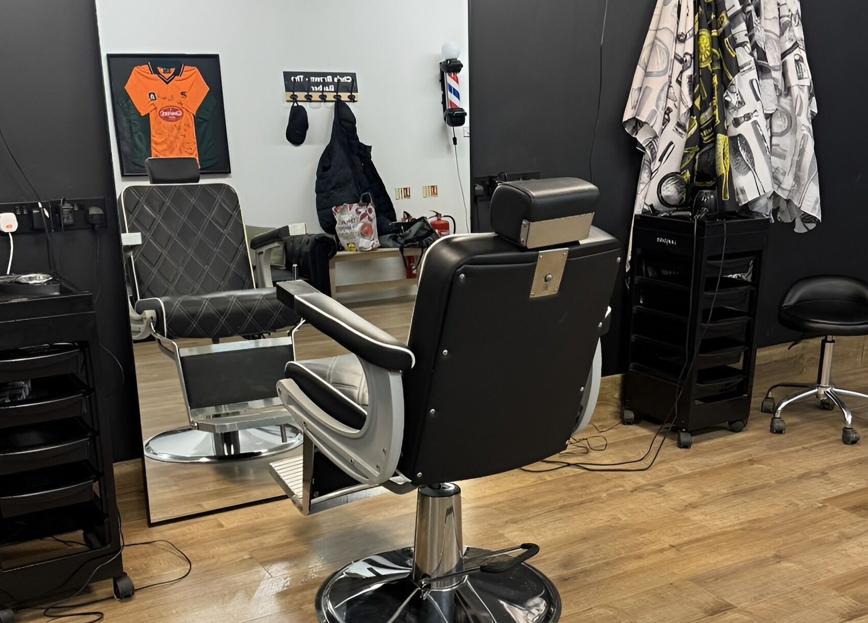 Interior of Chris Brown - The Barber in Plymouth, England, GB, featuring a sleek barber chair and modern decor.