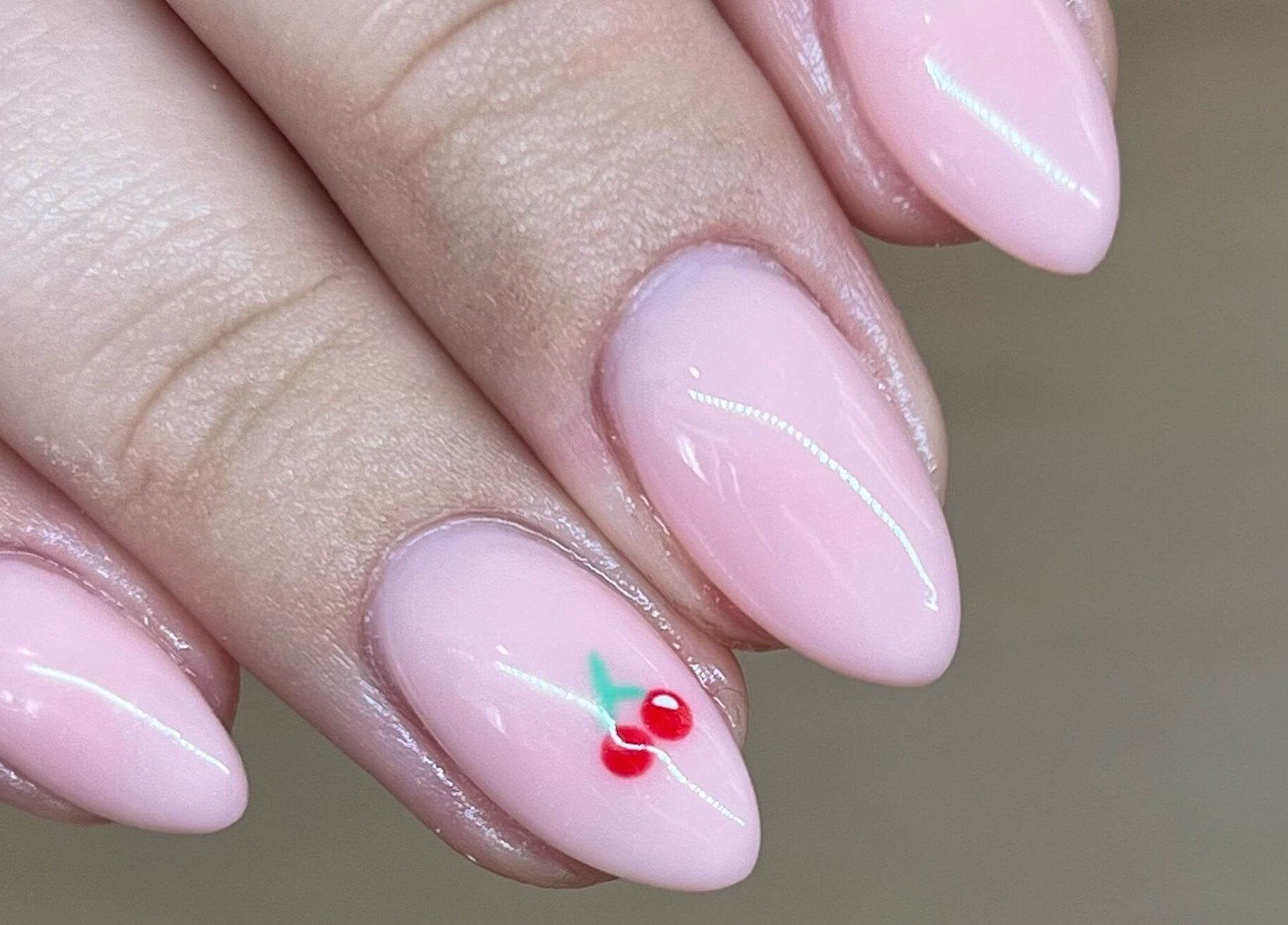 Elegant pink nails with cherry art at Beauty by Lydia, Burton Upon Trent, England, GB.