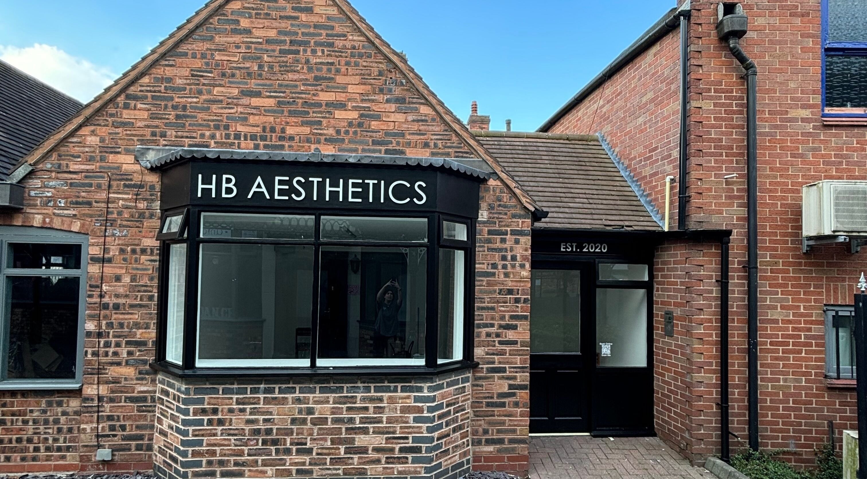 Front view of HB Aesthetics located in Cannock, England, GB, showcasing its inviting brick exterior.