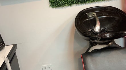 Modern wash station at Keda Beauty Empire, Siparia, Siparia Regional Corporation, TT offers top-notch salon services.