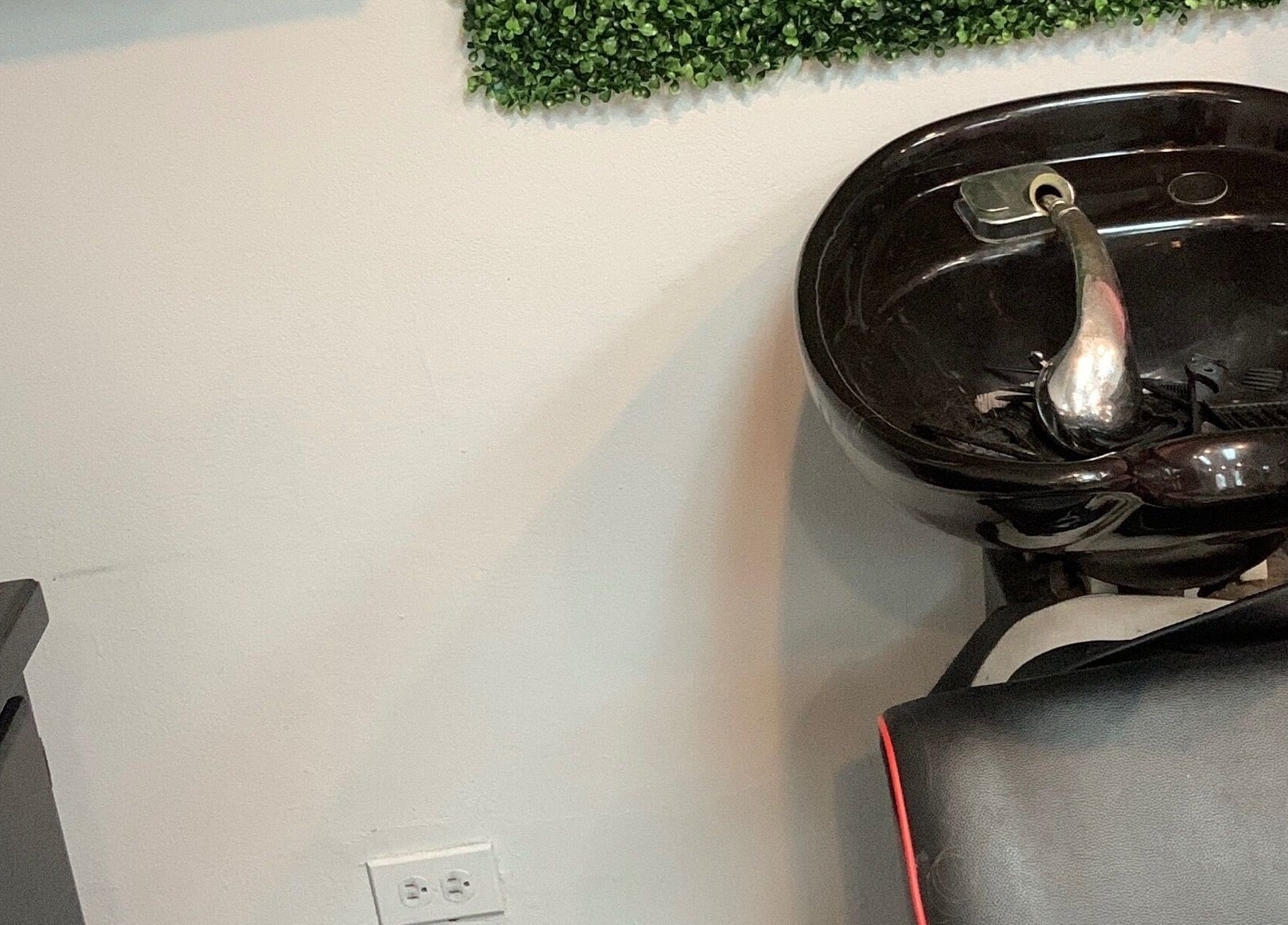 Shampoo station at Keda Beauty Empire, Siparia, Siparia Regional Corporation, TT, offering sleek salon services.