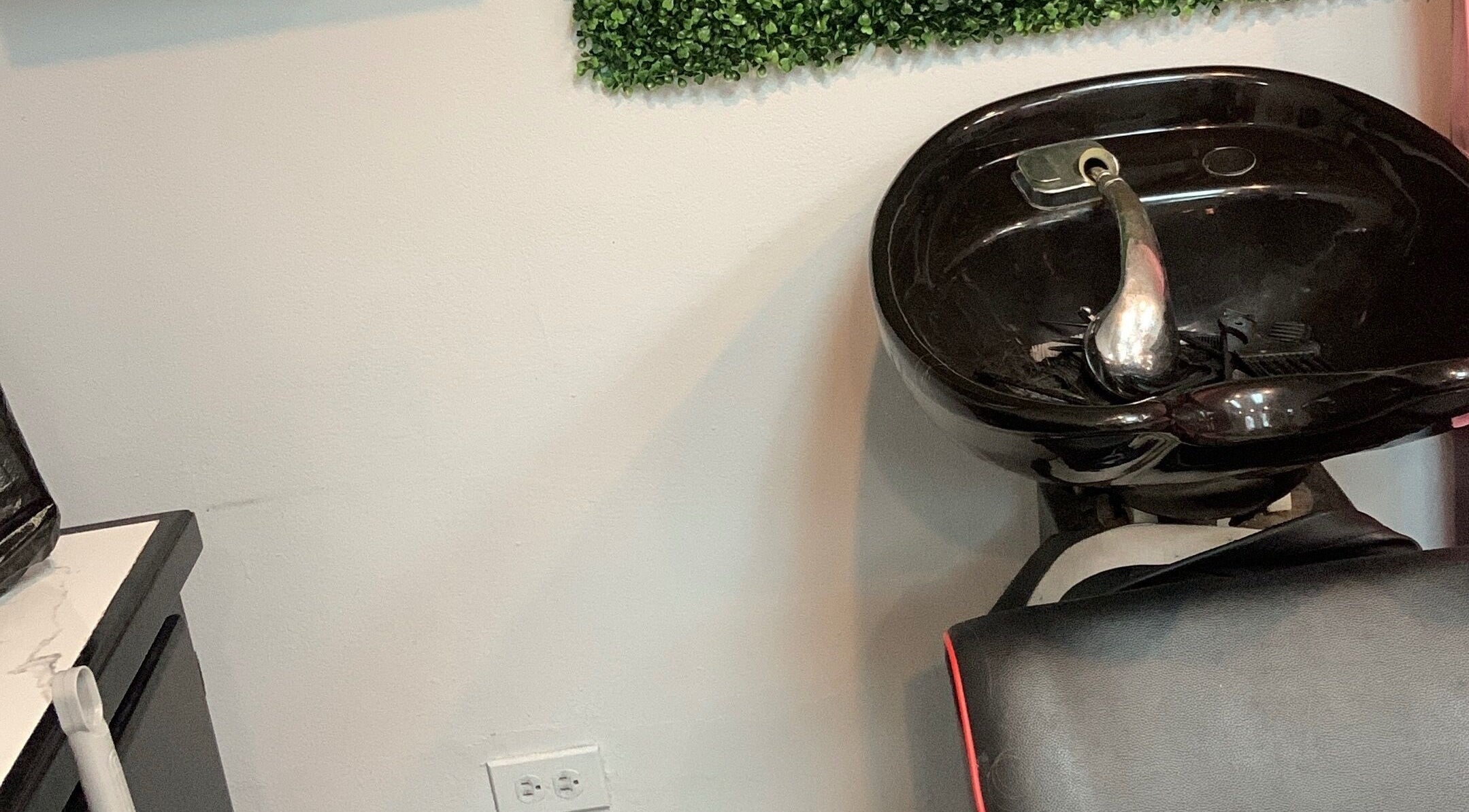 Shampoo station at Keda Beauty Empire, Siparia, Siparia Regional Corporation, TT, offering sleek salon services.