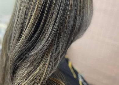 Elegant hairstyle at MariahCharm Simplicity Beauty, Auckland, Auckland, NZ showcasing smooth, highlighted locks.